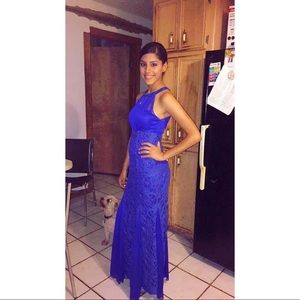 Worn once only. In the color royal blue.